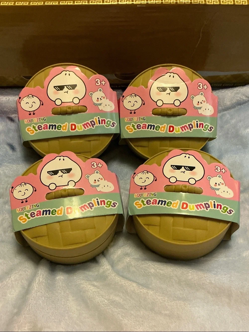 Squeezing (1) Large Glitter Steamed Fidget Dumplings Toy.